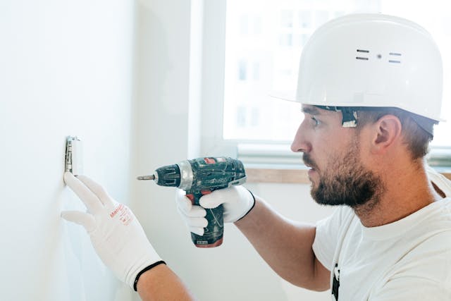 Handyman fixing a loose handle